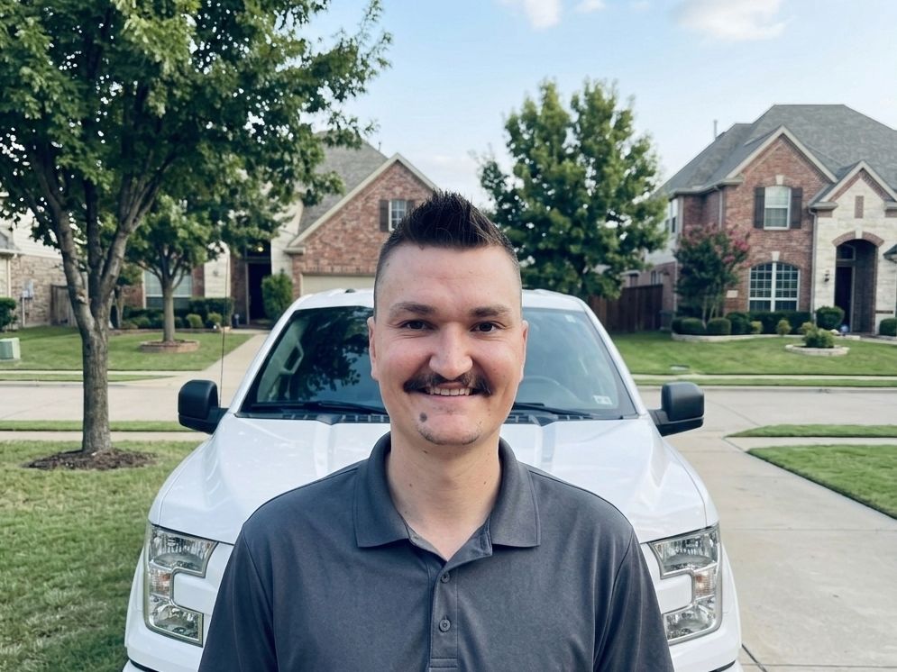 Heartland technician arriving at a home