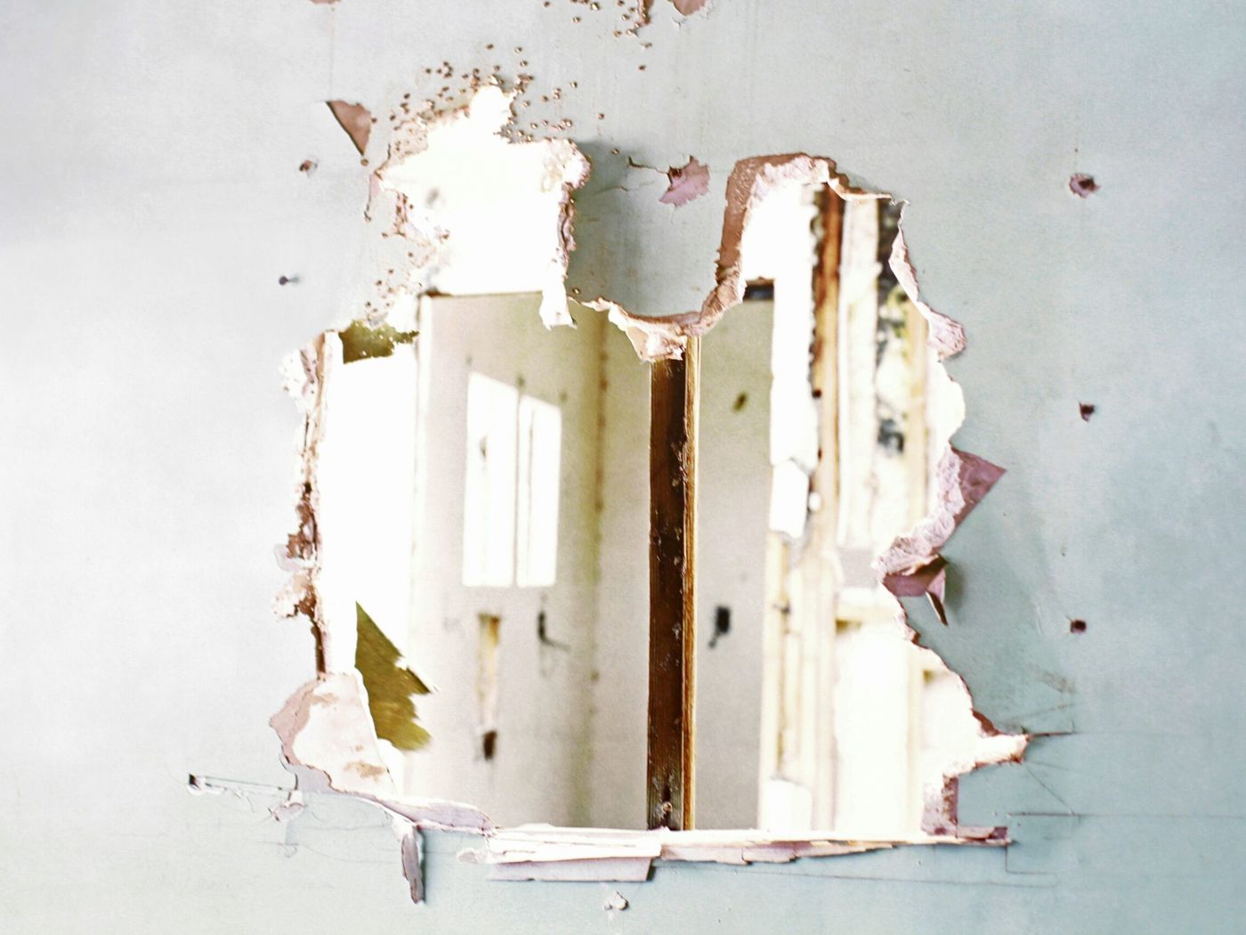 Drywall patch, before and after