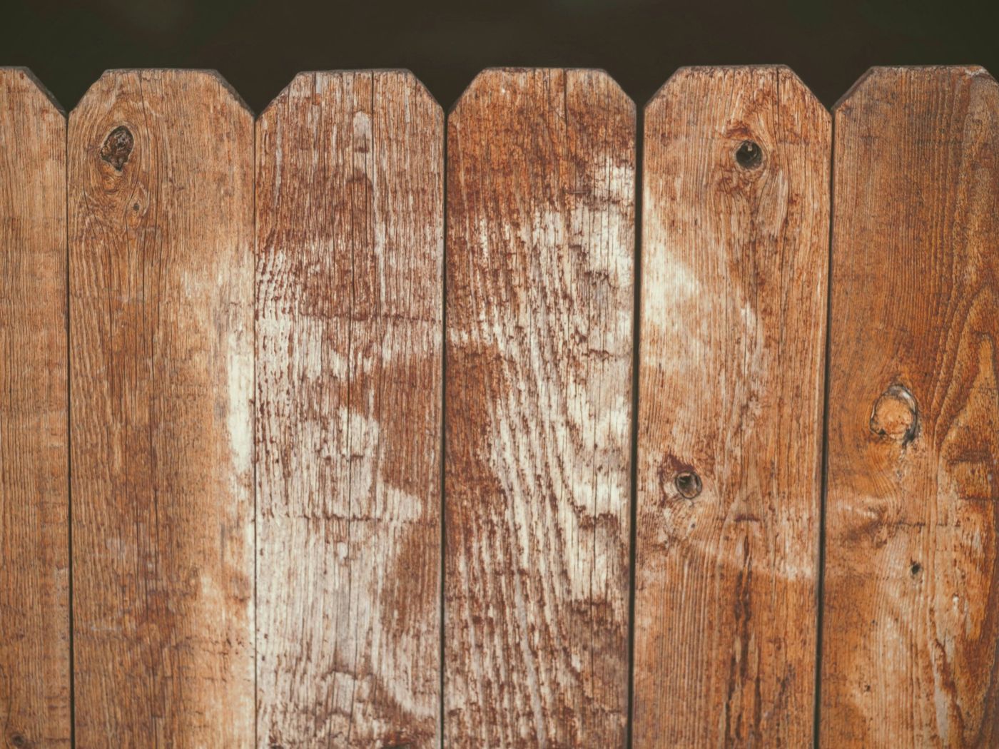 Wood fence section with new posts and pickets