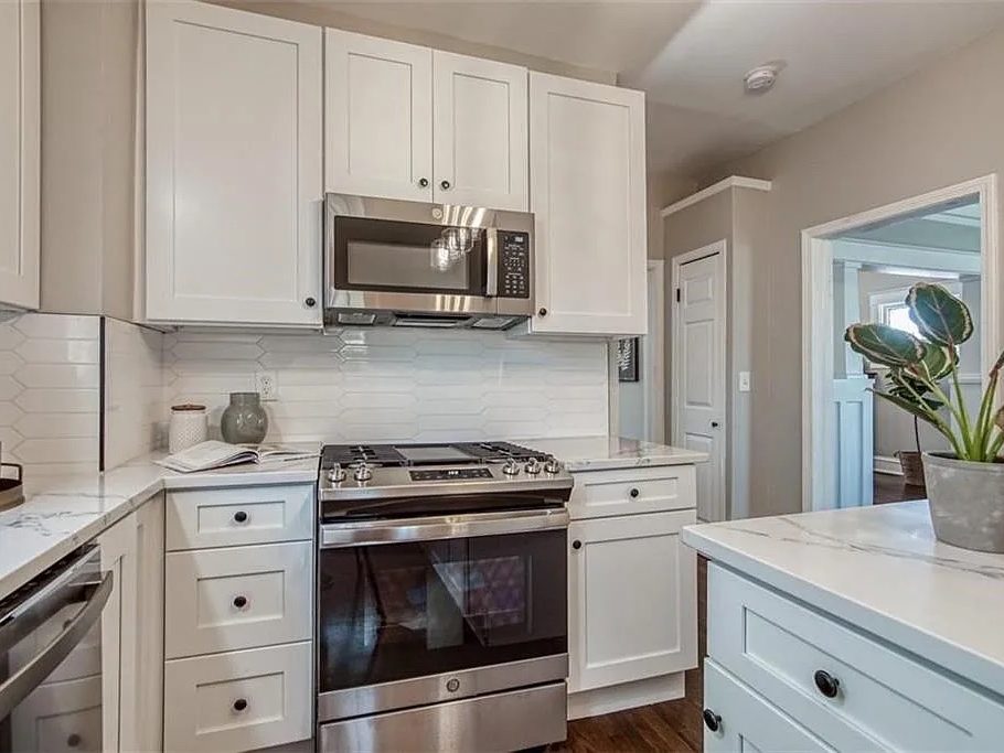 Bright, freshly finished kitchen with white cabinets