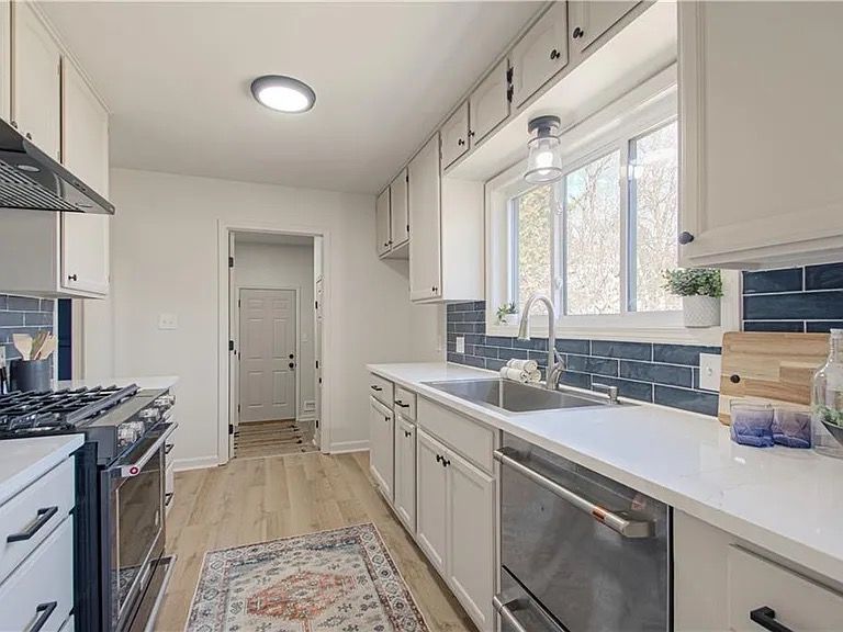 Galley kitchen refresh with white cabinets