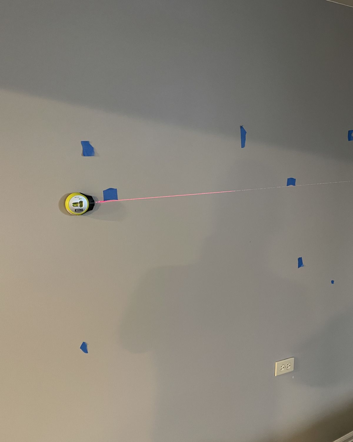 Laying out a TV mount with a laser level